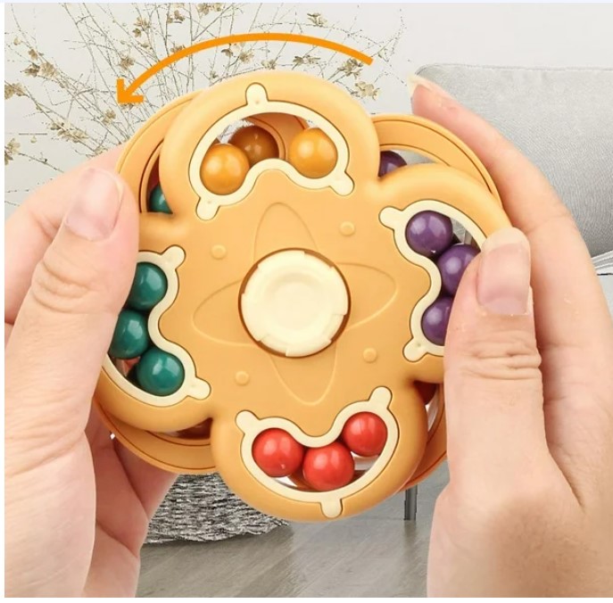 JUGUETES GIRATORIOS DE DOBLE CARA MOSTAZA